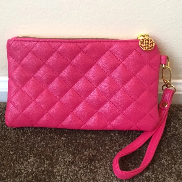 Pink wristlet with gold colored decoration and gold tone zipper - Picture 2 of 4